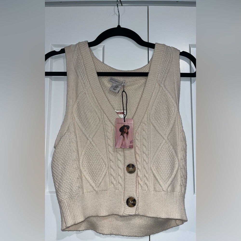 White sweater vest